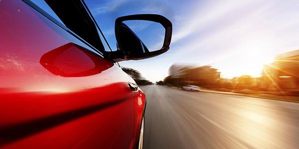 Side view of car on the road